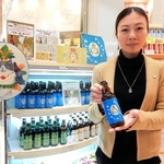 兵庫での販売が始まった愛媛県産のクラフトビール「マル・ザ・ホップ」＝神戸市東灘区、白鶴御影ＭＵＳＥ