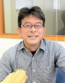 移住先の沖縄で、防災活動に取り組む稲垣暁さん＝那覇市銘苅２、なは市民協働プラザ