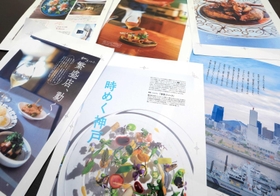 神戸特集の「あまから手帖７月号」校正刷り。いま注目の幅広い飲食店を紹介する（撮影・小林良多）