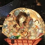 神戸の夜景を背に明かりがともされた「弘前ねぷた」の灯籠＝３日夜、神戸市中央区東川崎町１（撮影・吉田敦史）