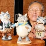 童話の主人公マルを題材にした陶芸作品を手にする森本秀男さん＝加東市上中