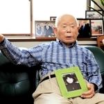日朝首脳会談から２０年を前に恵子さんへの思いを語る有本明弘さん＝神戸市長田区