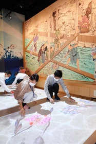 魚取りの疑似体験ができる展示＝神戸市兵庫区中之島２、ひょうごはじまり館