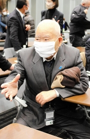 国際セミナーに出席した有本恵子さんの父明弘さん＝９日午後、東京都千代田区