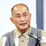 「追悼の集い」に遺族代表として臨む思いを語る上野政志さん＝１１日午後、神戸市役所