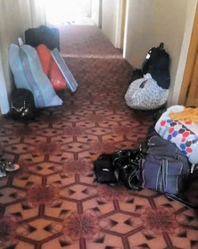 西垣さんが建設したナンガルハル大学の女子寮から届いた写真。閉め出される女子学生がまとめた荷物が並ぶ（本人提供）