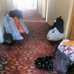 西垣さんが建設したナンガルハル大学の女子寮から届いた写真。閉め出される女子学生がまとめた荷物が並ぶ（本人提供）