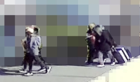 容疑者が住む自宅の近くで防犯カメラに映っていた４人の人物＝神戸市西区、住民提供（画像を加工しています）