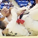 柔道男子団体決勝・望海-龍野西　大外刈りを決める望海の大将森部（上）＝兵庫県立武道館