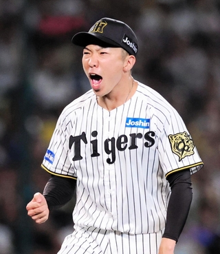 阪神-ＤｅＮＡ　８回表２死満塁のピンチを切り抜けた阪神・石井（撮影・中西幸大）