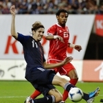 日本代表でプレーするハーフナー・マイク（左）