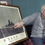 戦艦大和の写真を使って戦闘の様子などを話す竹田明さん（２００８年１月２７日）