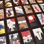 豊岡市の名所や特産品などを落とし込んだイラストで制作した花札。革を貼って縁取ってある＝豊岡市小田井町