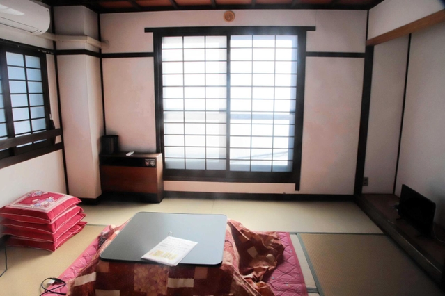 本館ホテルとみやの客室＝香美町村岡区大笹