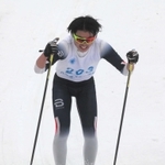 高校男子クロスカントリーのクラシカル１０キロでゴールする田淵瑠希選手＝おじろスキー場