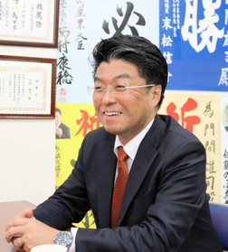 門間雄司氏
