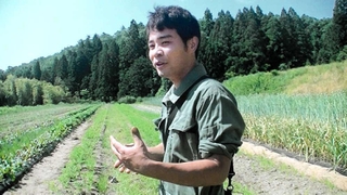 農業の魅力などを語る小山収平さん＝豊岡市出石町