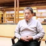 城崎大火の消火活動を振り返る椿野仁司・城崎消防団長＝豊岡市城崎町湯島
