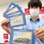 市内５カ所でスタンプを押すと完成する黒井城跡のポストカード＝丹波市氷上町成松、市役所本庁舎