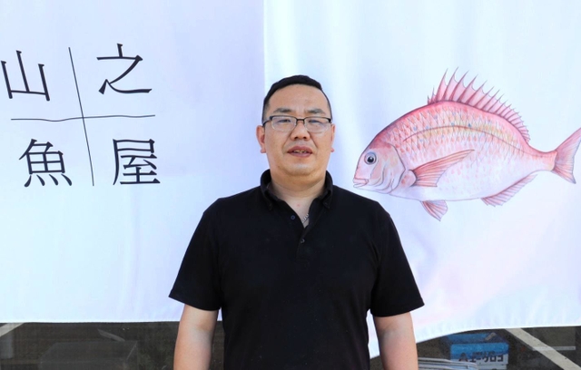 店主の西村孝さん。「気軽に足を運んでほしい」と話す