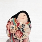 近代の淡路で制作された、おたふくをかたどった香合＝兵庫陶芸美術館