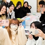 居合わせたみんなと一緒に「ビーリアル」。ポーズをとってパシャリ＝加古川市平岡町新在家、兵庫大