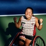 　車いすの部女子シングルスで決勝進出を決め、笑顔を見せる上地結衣＝ニューヨーク（共同）
