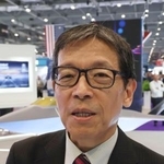　次期戦闘機開発について話すＧＩＧＯトップの岡真臣氏＝９日、ロンドン（共同）