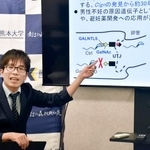 　記者発表会で説明する熊本大生命資源研究・支援センターの野田大地准教授＝１８日午前、熊本市