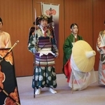 　時代祭を前に、公開された（左２人目から）楠木正成の家来役のよろい、常盤御前の衣装など＝６日午前、京都市左京区