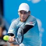 　男子シングルス決勝でプレーする田口涼太郎＝有明コロシアム