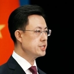 　記者会見する中国外務省の郭嘉昆副報道局長＝２１日、北京（共同）