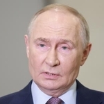 　２３日、モスクワで記者団の質問に答えるロシアのプーチン大統領（タス＝共同）