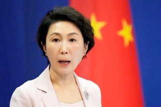 　記者会見する中国外務省の毛寧報道局長＝２１日、北京（共同）