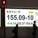 　外国為替市場の対米ドルの円相場を表示するボード＝１８日午後、東京都中央区
