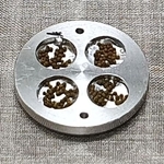 　実験装置に入れたコケ胞子の粒。１粒に約４千個の胞子が入っている（藤田知道教授ら提供）