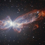 　米国立光学赤外線天文学研究所が公開した、宇宙を羽ばたくチョウのように見える星雲の画像（同研究所提供）