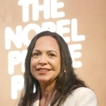 　記者会見するベネズエラの野党指導者マリア・コリナ・マチャド氏＝１１日、ノルウェー・オスロ（共同）