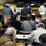 　石川県が２次避難している被災者向けに開いた説明会＝２０２４年２月、石川県加賀市