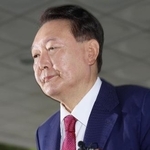 　７月、特別検察官の取り調べを受けるため、ソウル高検に入る韓国の尹錫悦前大統領（聯合＝共同）