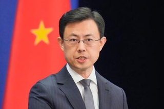 　記者会見する中国外務省の郭嘉昆副報道局長＝２０日、北京（共同）