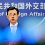 　記者会見する中国外務省の郭嘉昆副報道局長＝２１日、北京（共同）