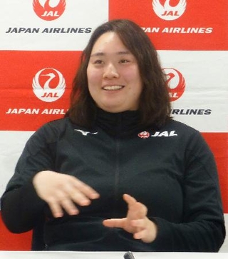 　記者会見する陸上女子やり投げの北口榛花＝１４日、羽田空港