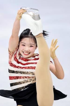 　女子ＳＰ　演技する中井亜美＝ミラノ（共同）