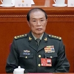 　２０２５年３月、中国全人代の閉幕式に出席した何衛東・中央軍事委員会副主席＝北京の人民大会堂（共同）