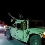 　２６日に公開された動画で、アフガニスタン国内を走行する軍用車両（アフガン国防省提供、ロイター＝共同）