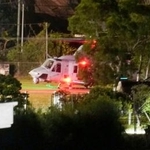 　野球場に緊急着陸した米軍のヘリコプター＝６日午後１０時３５分、沖縄県名護市