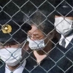 　斎藤貢被告（中央）＝昨年１月