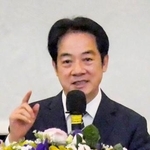 　１４日、台北市で開かれた討論会で発言する台湾の頼清徳総統（共同）