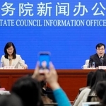 　主要統計を発表する中国国家統計局の記者会見＝１６日、北京（共同）